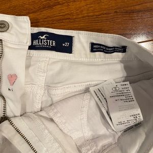 white Hollister shorts with heart stitch